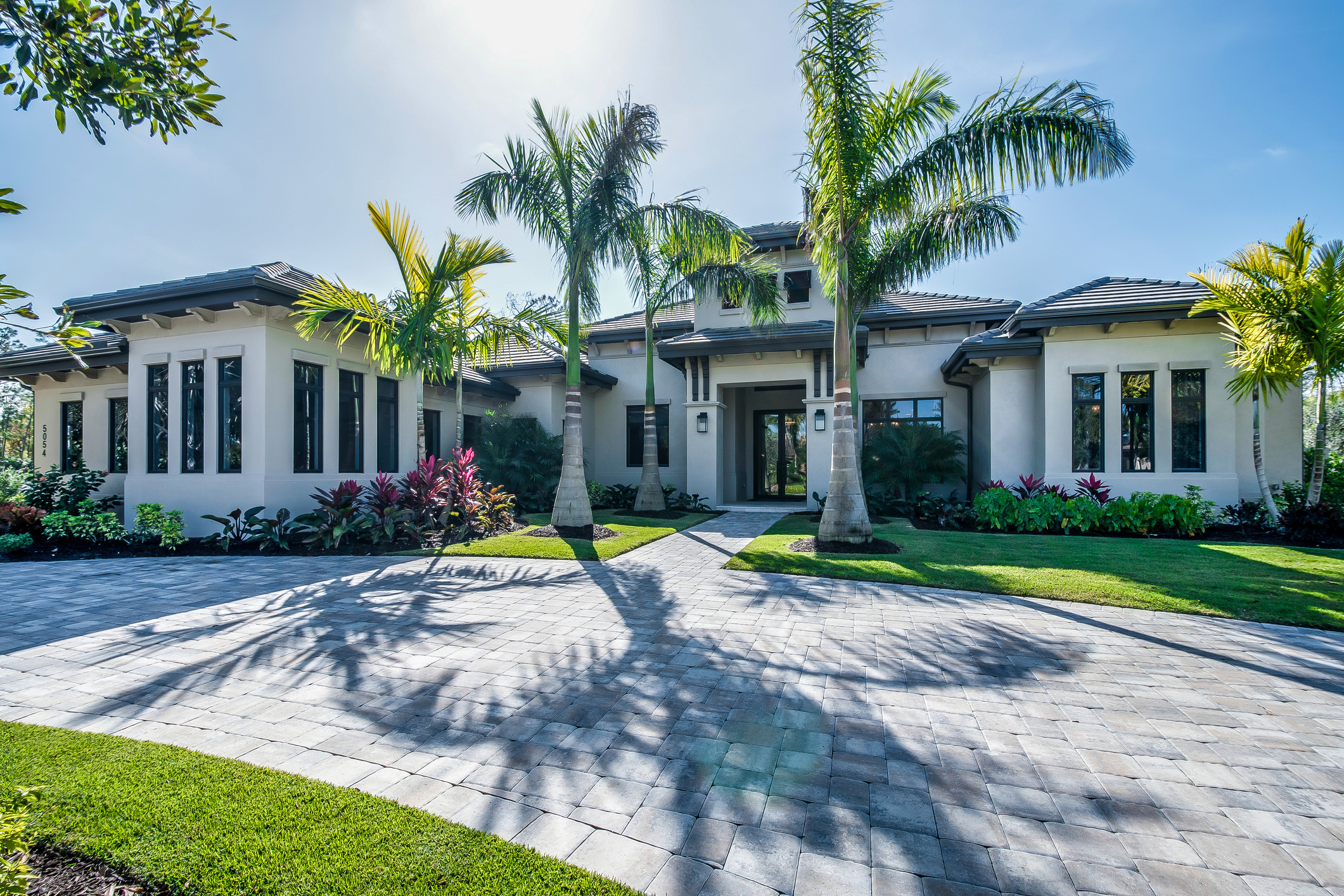 Tropical estate with palm trees at 5161 Richmond Street