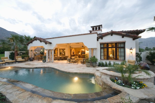 Spanish colonial estate with pool and courtyard