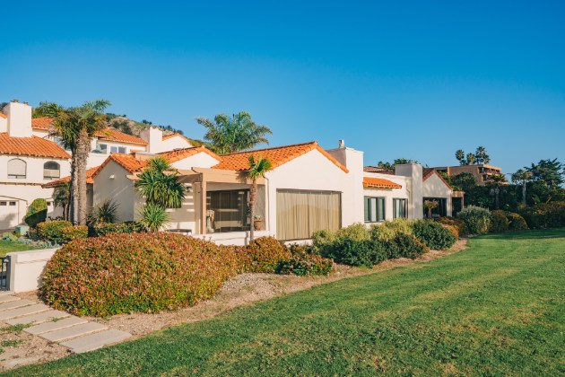 Spanish-style community with manicured lawns